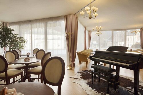 Гостиница Ramada Hotel & Suites by Wyndham Kranjska Gora в Краньска-Горе