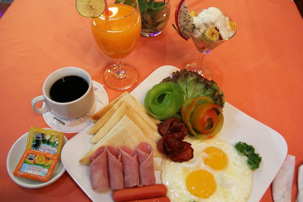 Фото Tropical Breeze Guesthouse