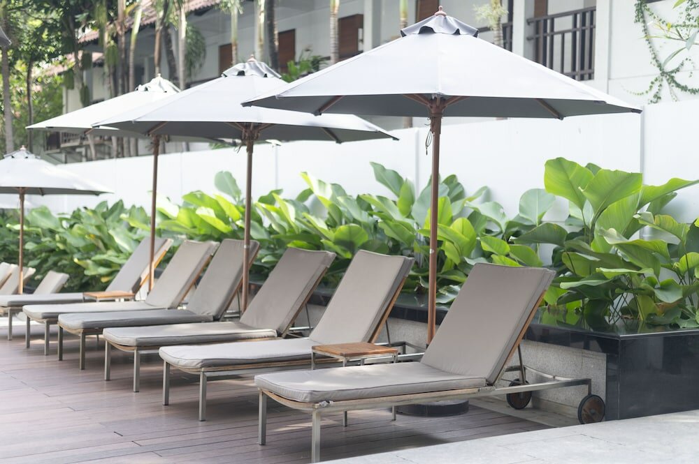 Фото Woodlands Suites Serviced Residences