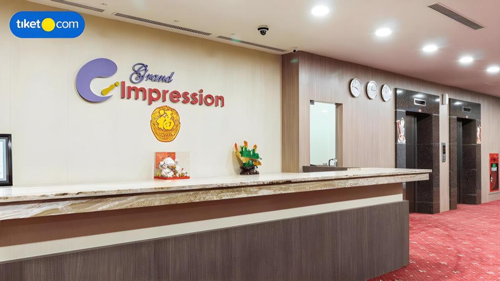 Фото Grand Impression Hotel Medan