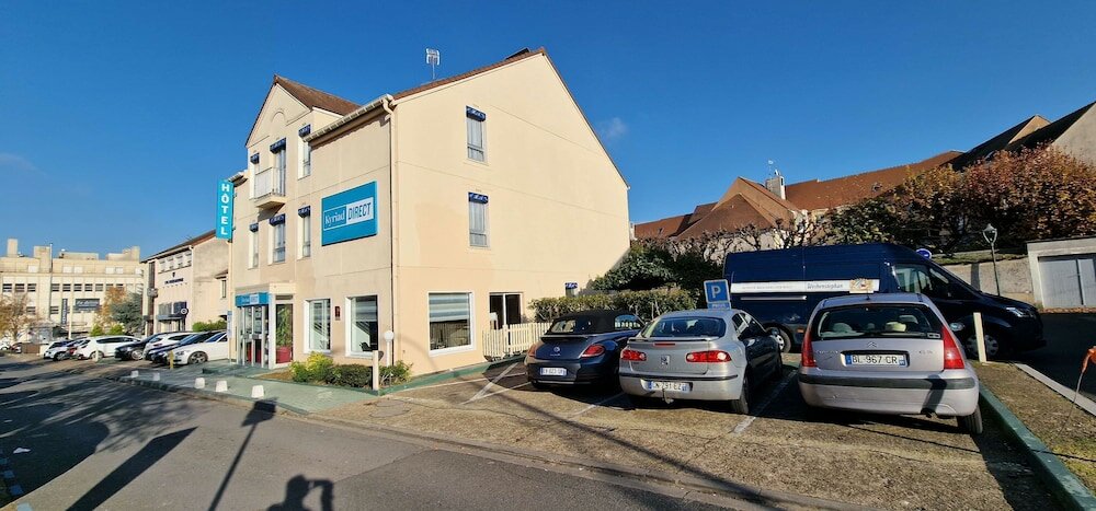 Фото Kyriad Direct Arpajon