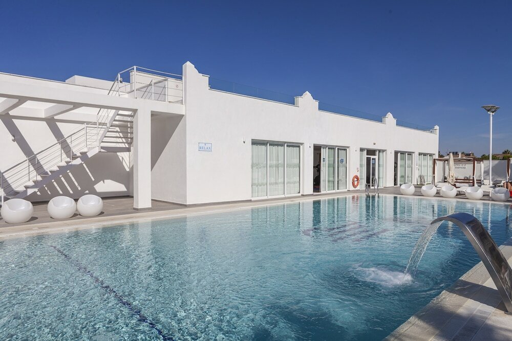 Фото Playa De La Luz Hotel