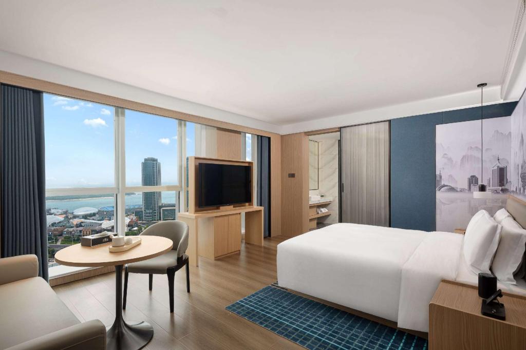 Фото Microtel by Wyndham Qingdao Huangdao