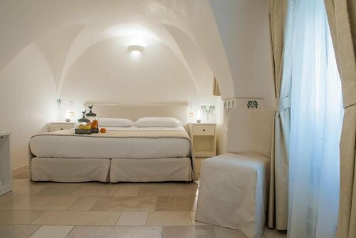 Внешний вид отеля Dimora dell'Osanna в Каровиньо, фото 2