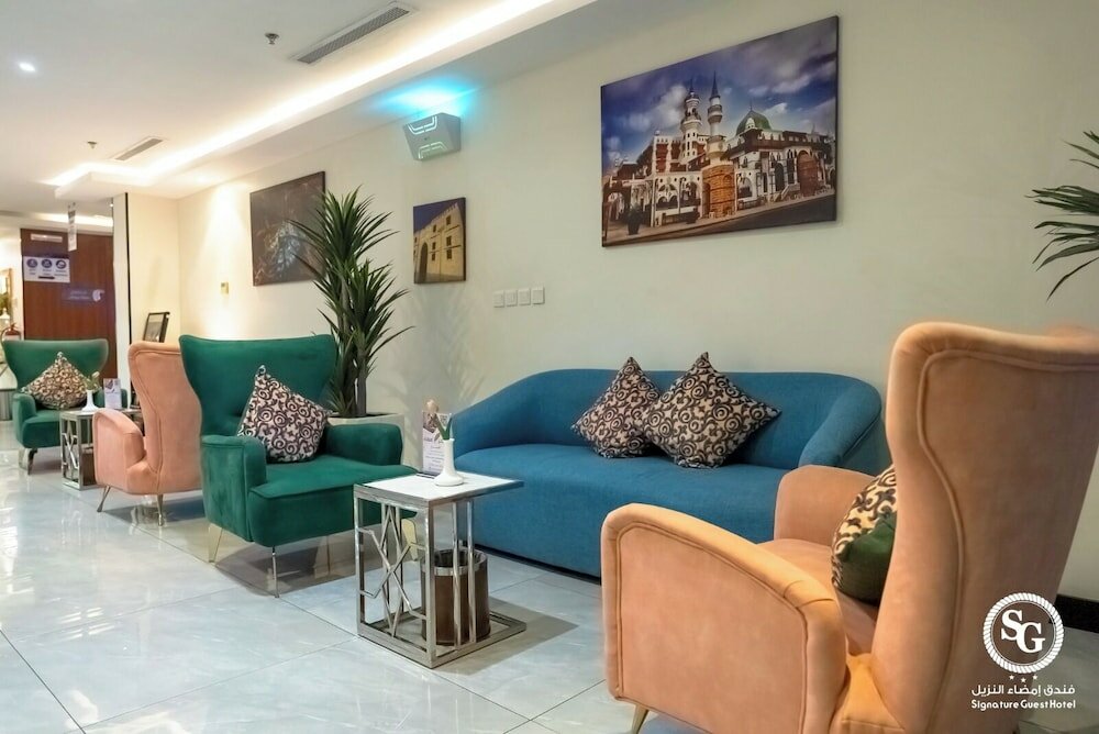 Фото Signature Guest Hotel