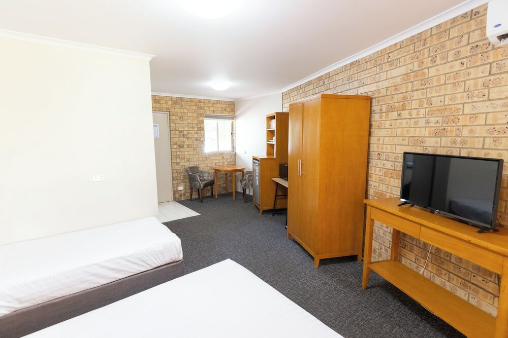 Фото Sundowner Hotel Motel