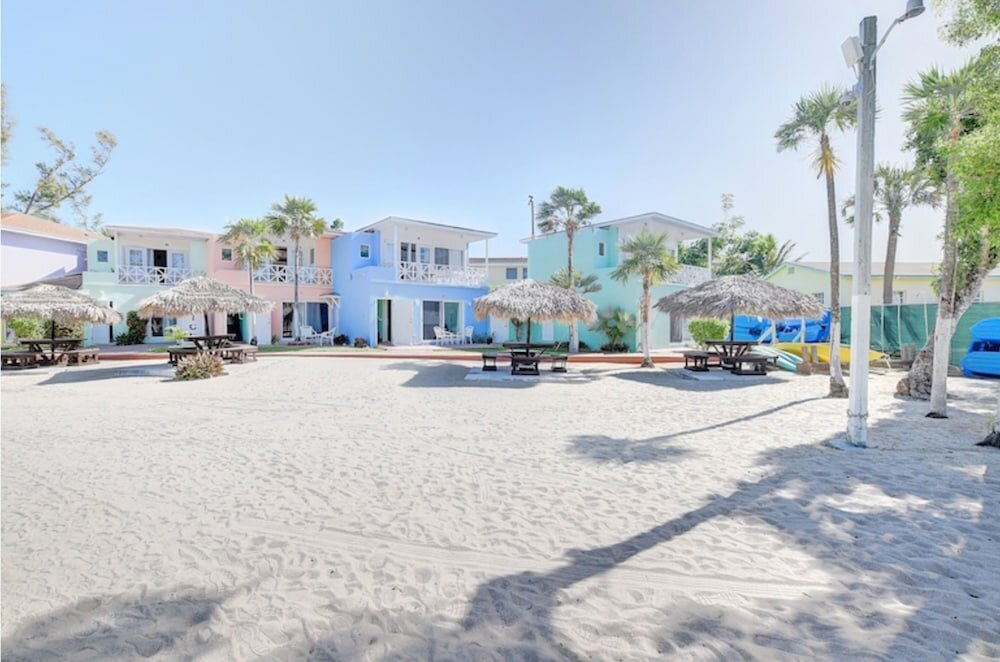 Фото Coral Harbour Beach House And Villas