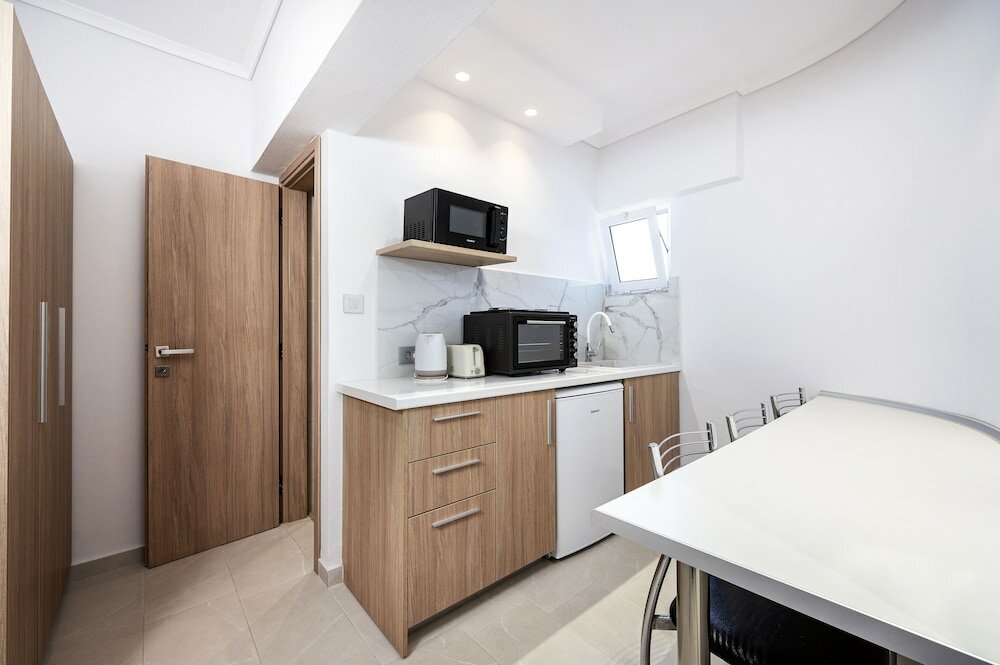 Фото Poseidon Hotel and Apartments