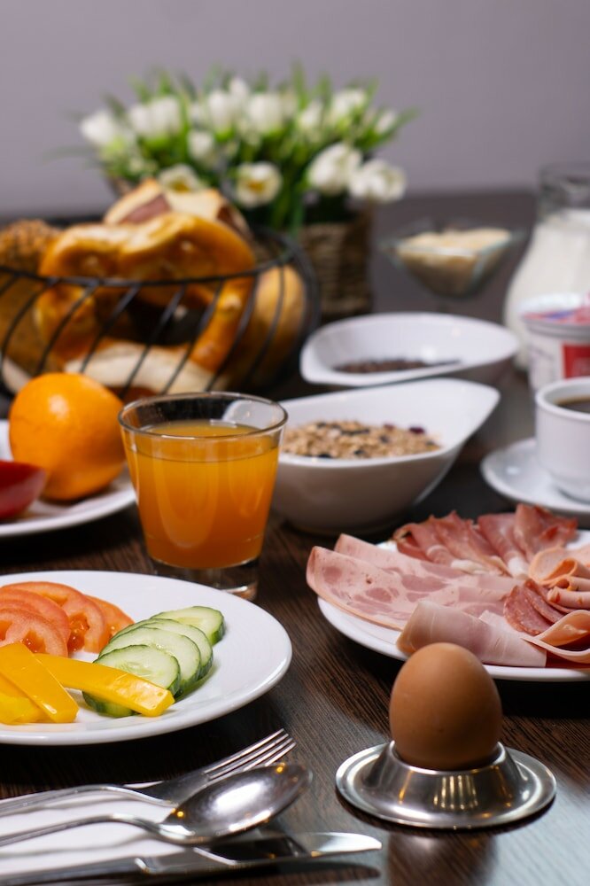 Фото Orange Hotel und Apartments