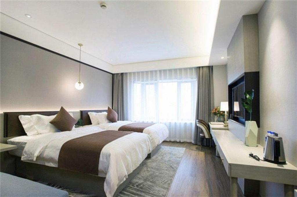 Фото Gya Hotel Shanghai Long Distance Passenger Terminal Station