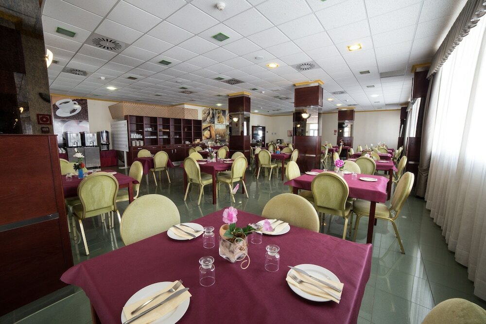 Фото Hotel La Familia Gallo Rojo