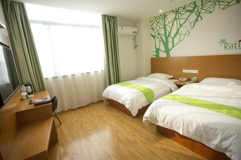 Фото Vatica ZaoZhuang TengZhou Railway Station Hotel