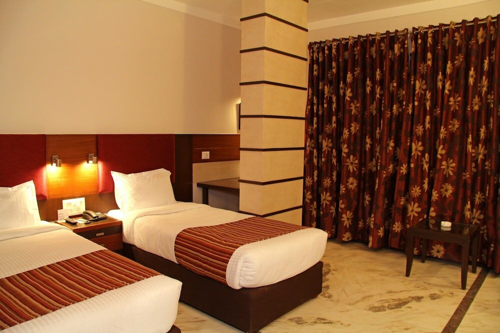 Фото Amantra Comfort Hotel