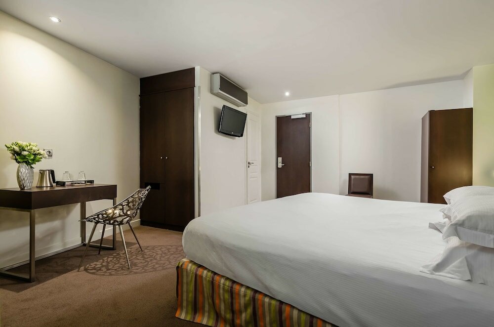 Фото Hotel Arc de Triomphe