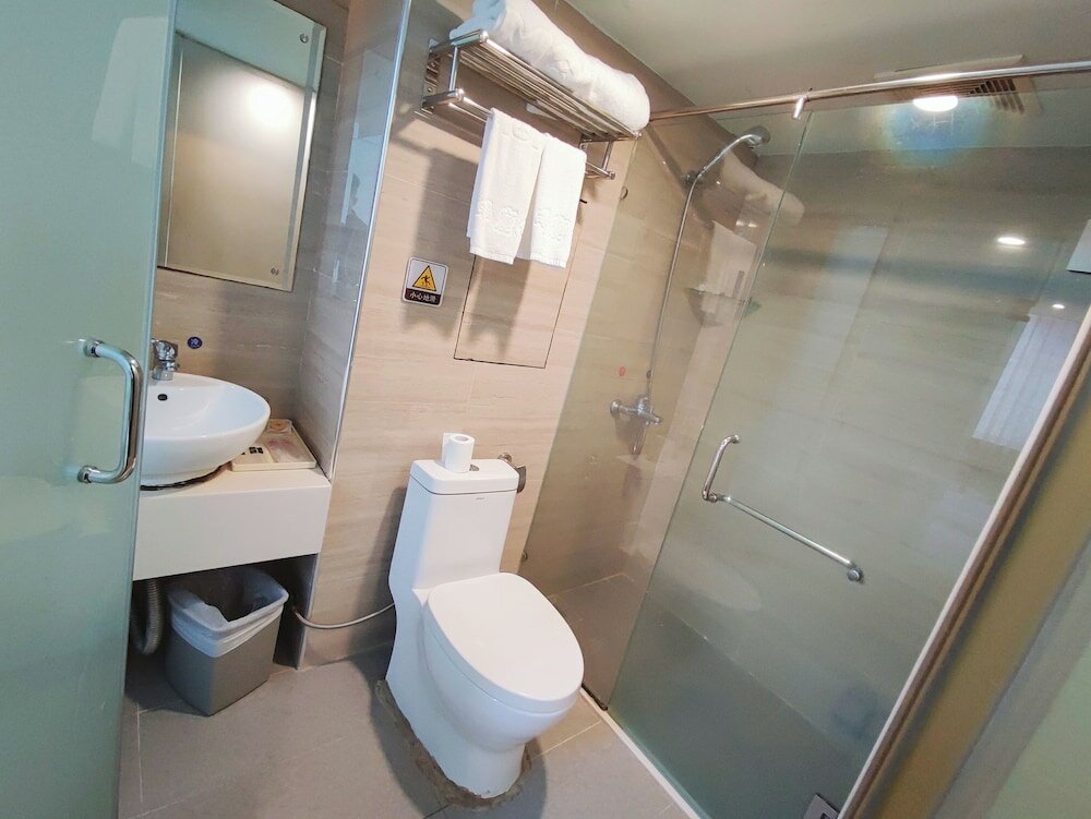 Фото Xinghua Hotel