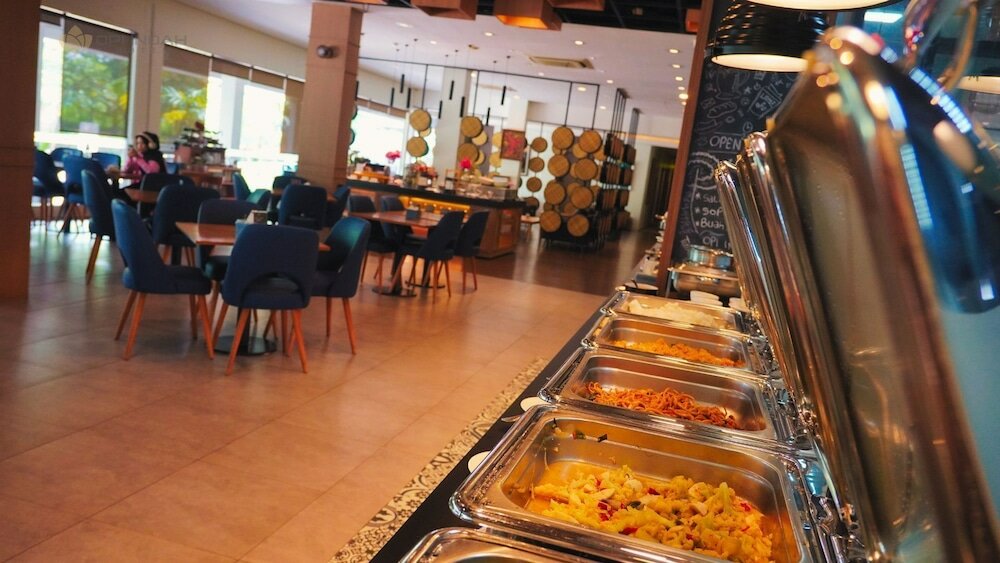 Фото Opi Indah Hotel