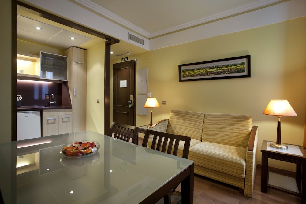 Фото Suites Gran VIA 44 Apartahotel