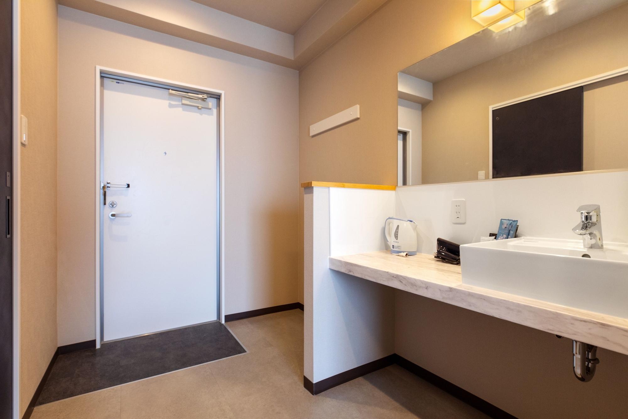 Фото Mr. Kinjo in Grand Blue Chatan