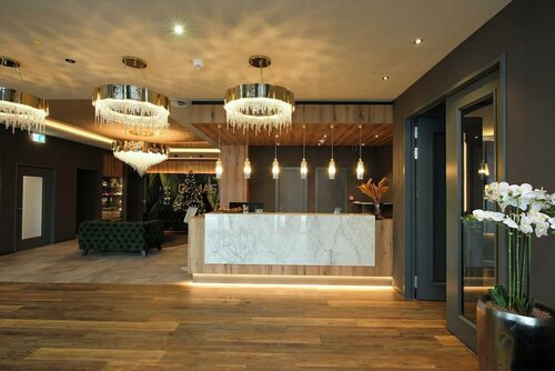 Гостиница Hotel Demas Unterhaching в Унтерхахинге