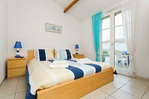 Апартаменты Madame Vacances Le Domaine de Vertmarines в Ле-Сабле-д'Олоне