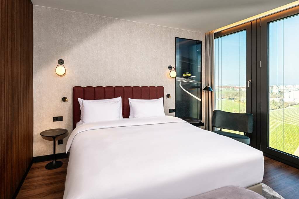 Фото Radisson Blu Hotel At Porsche Design Tower Stuttgart