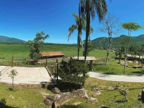 Фото Casa de Vidro - Hospedar com Propósito