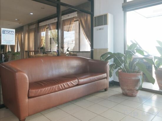 Фото Capital O 740 Bliss Hotel Dau