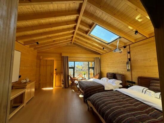 Hotel Deqin Fushouju Homestay, Dêqên, photo