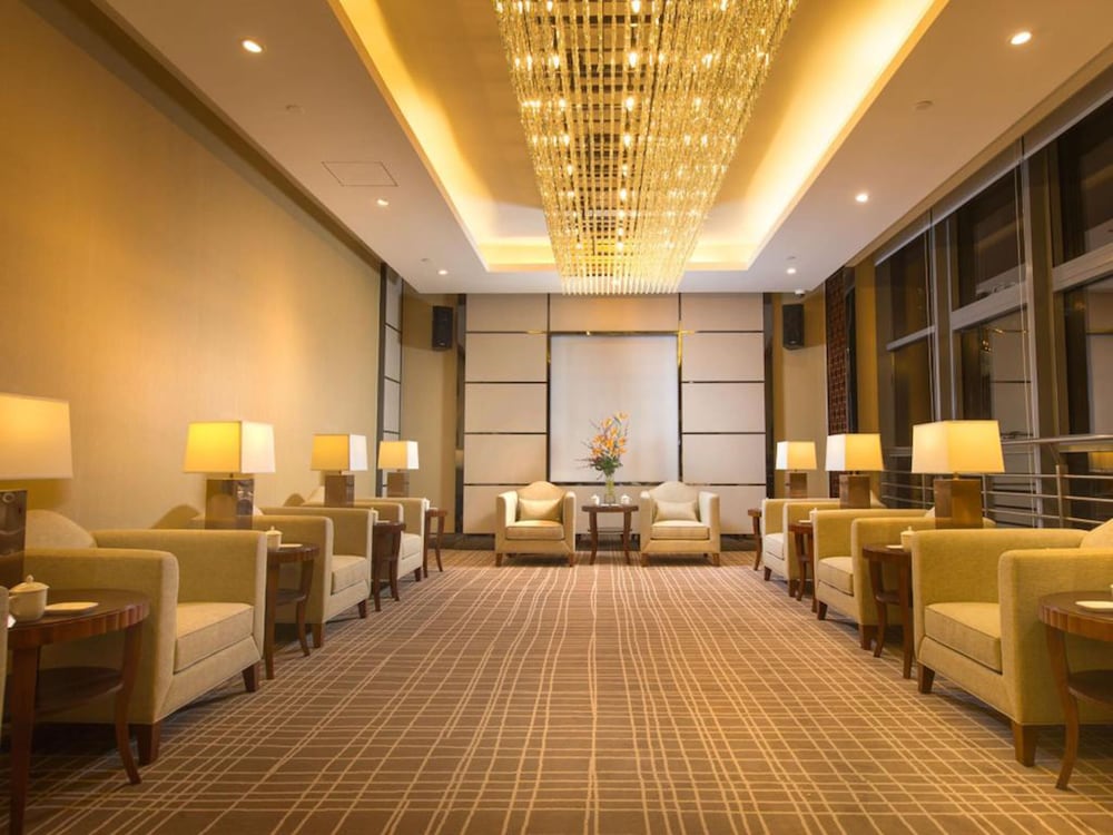 Фото Yiwu ShangCheng Hotel