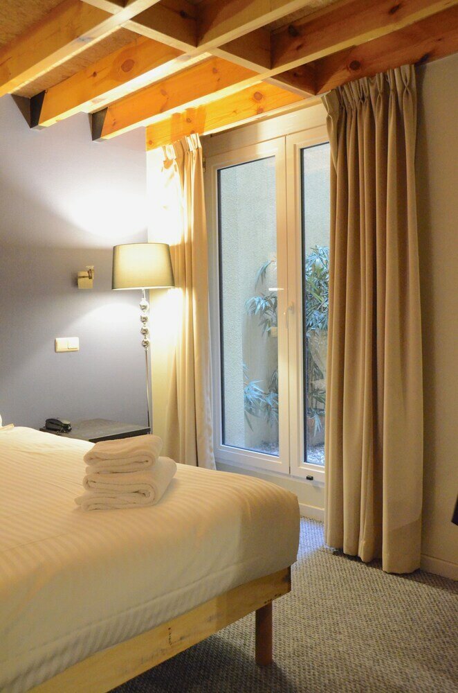 Фото Numa i Scoop Rooms & Apartments