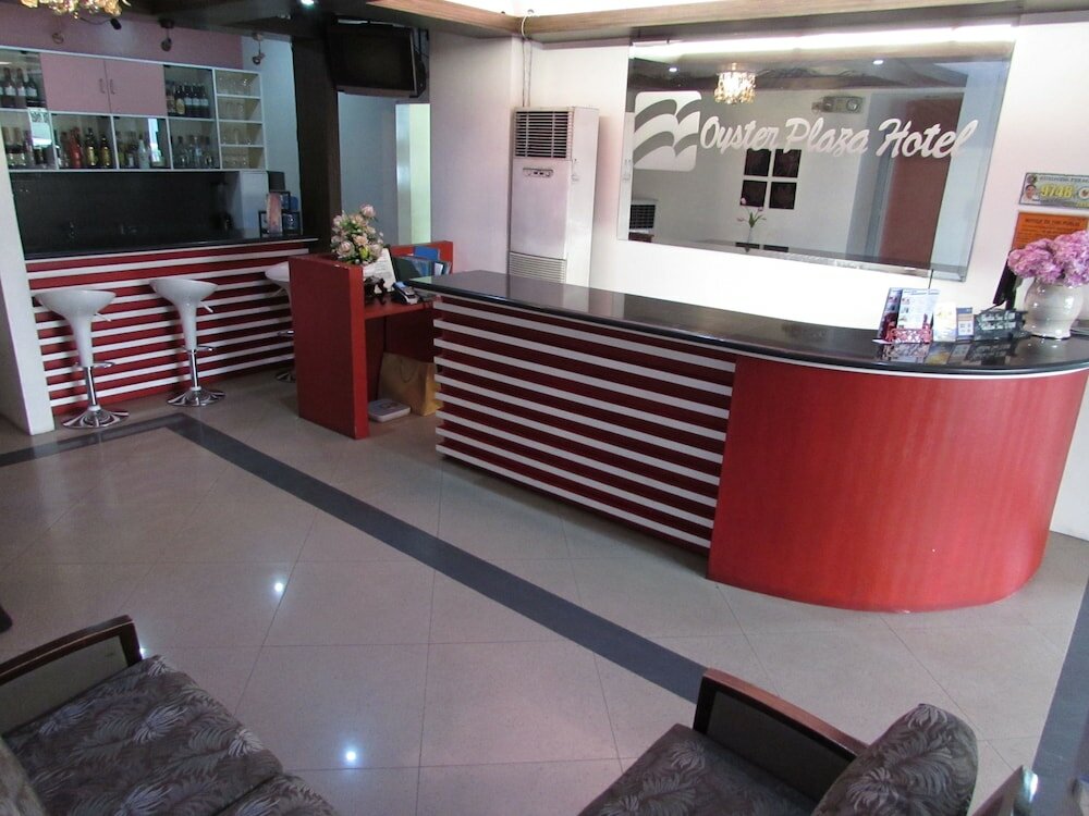 Фото Oyster Plaza Hotel