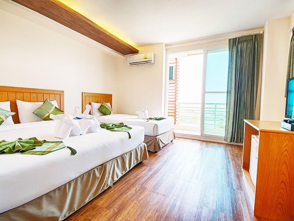 Фото TM Land Hotel