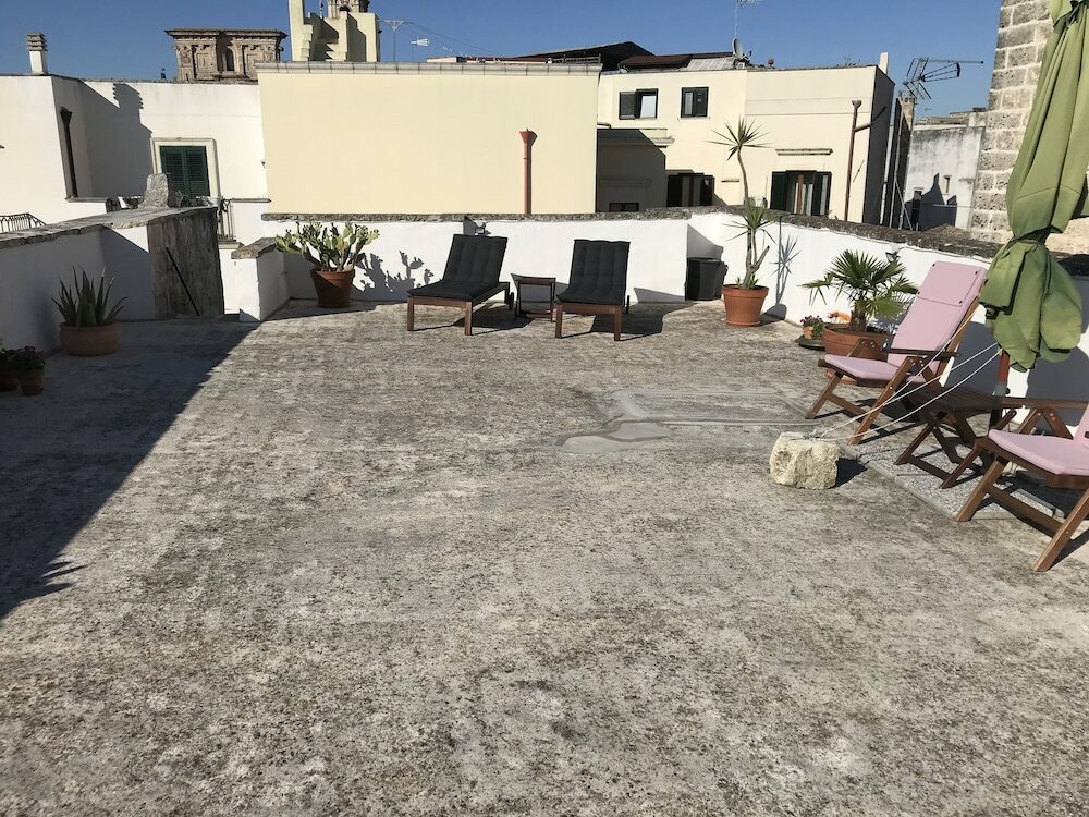 Фото Palazzo Cariddi Boutique B and B