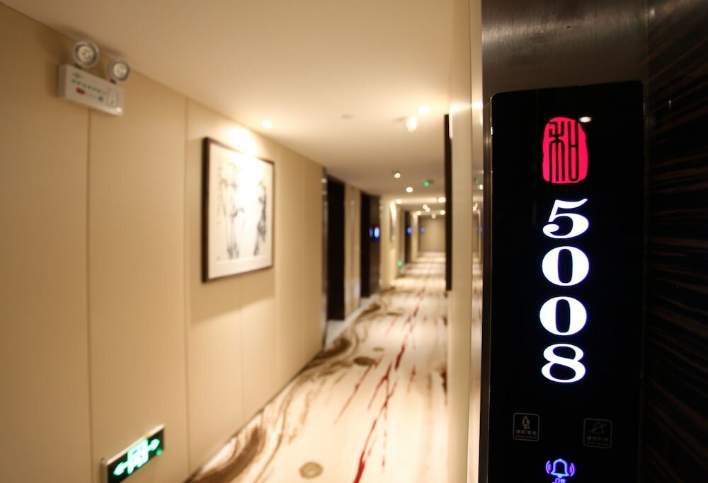 Фото Luoyang Yihe Hotel