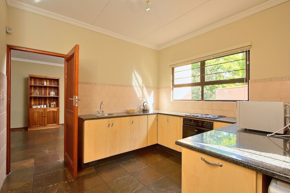 Фото Centurion Golf Suites Boca Walk