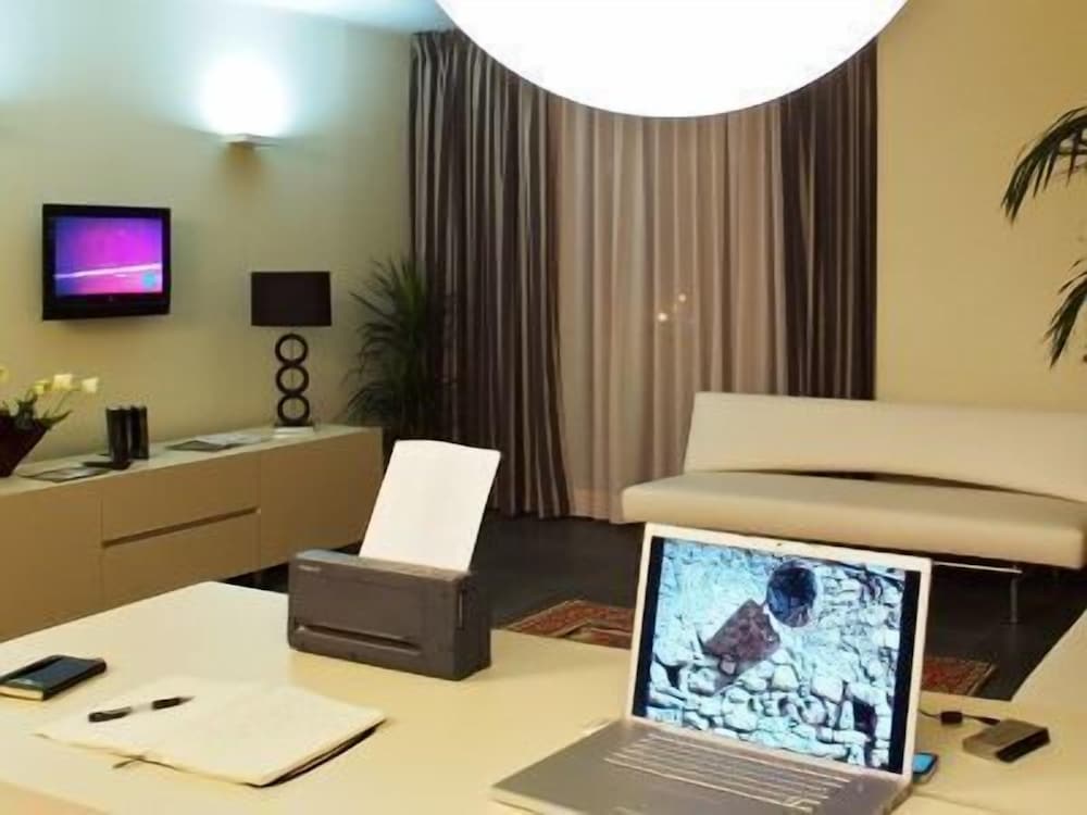 Фото Home Club Suite Hotel