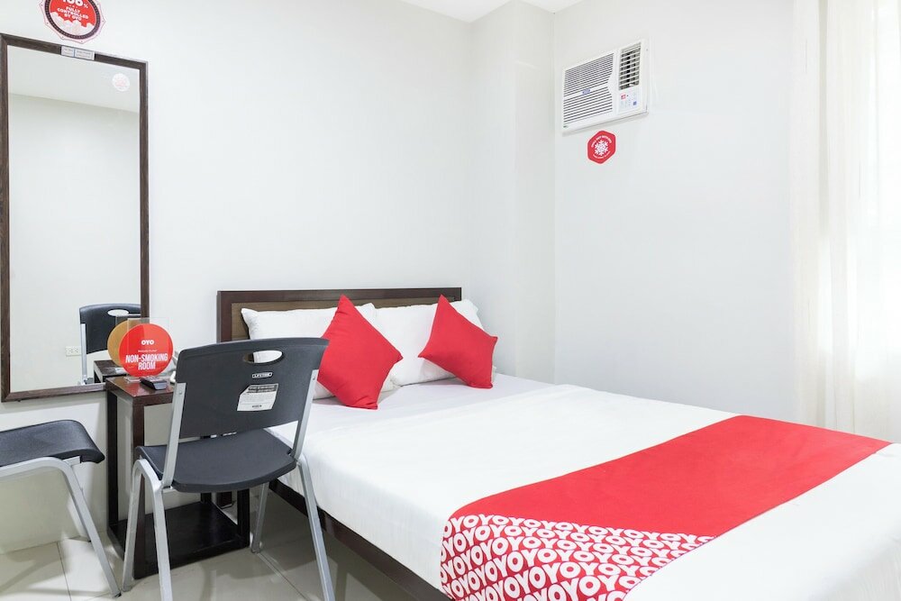 Фото Oyo 152 Sangco Condotel