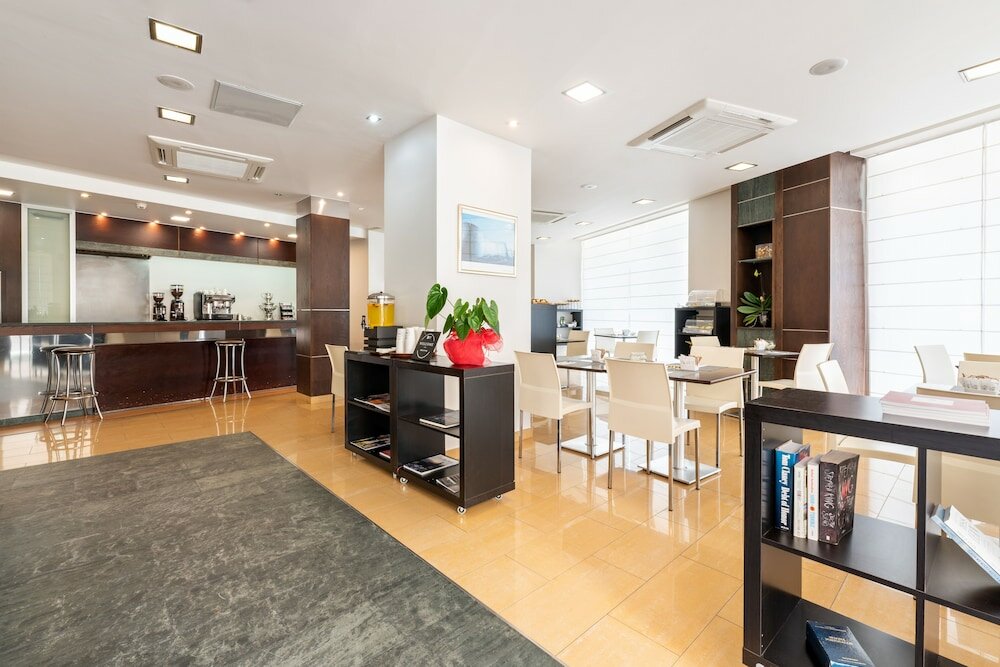 Фото Hotel Exe Puerta de San Pedro