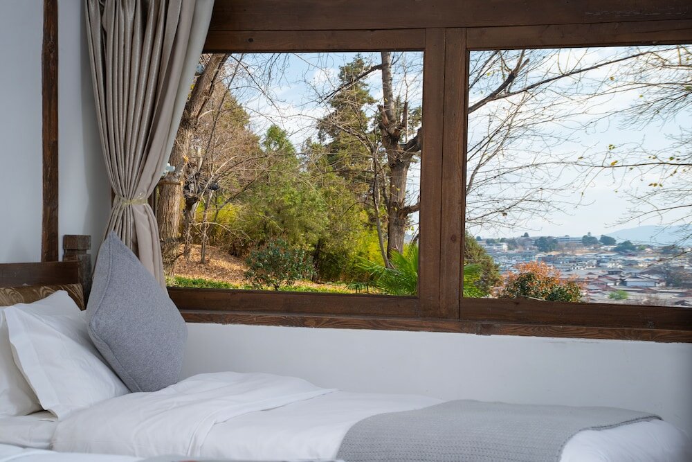 Фото Merry Inn Lijiang