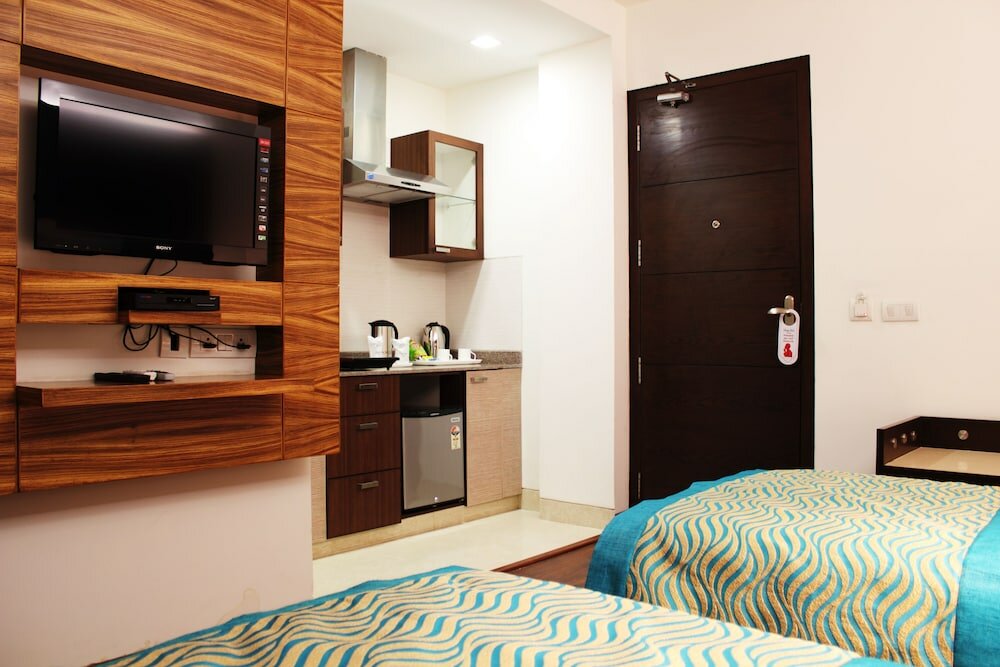 Фото Stately Suites MG Road