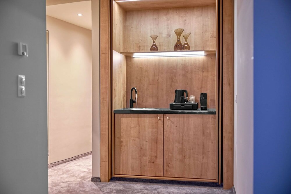 Фото Wasserturm Hotel Cologne, Curio Collection by Hilton