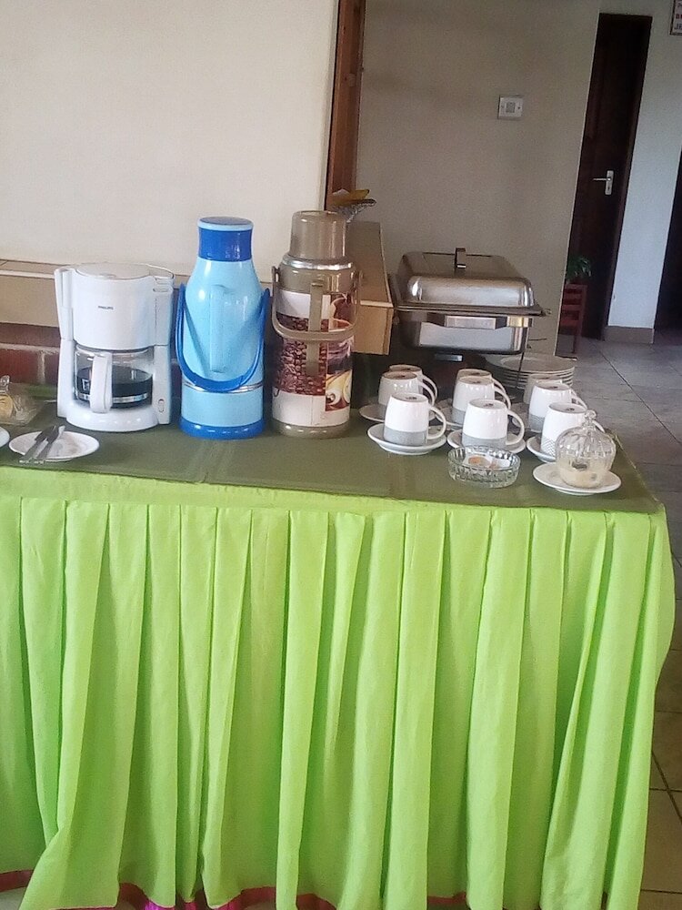 Фото New Scroll Inn Hotel