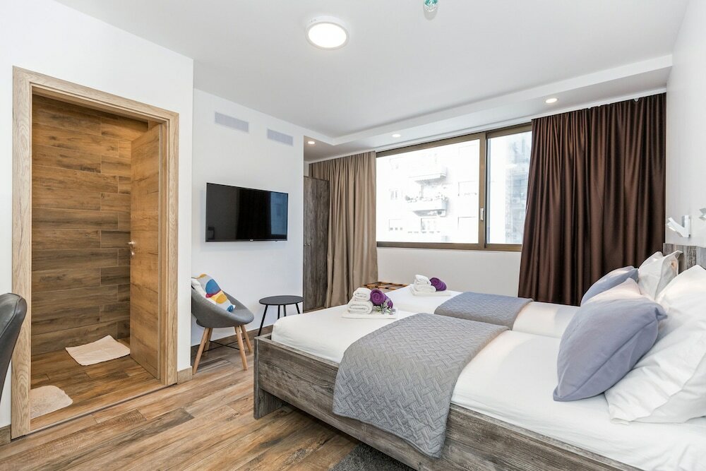 Фото Apinelo Tower Rooms