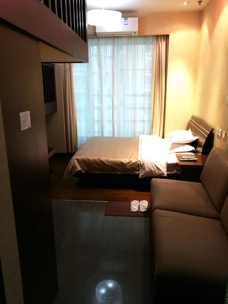 Фото Shanghai Abest Xinshikong Apartments