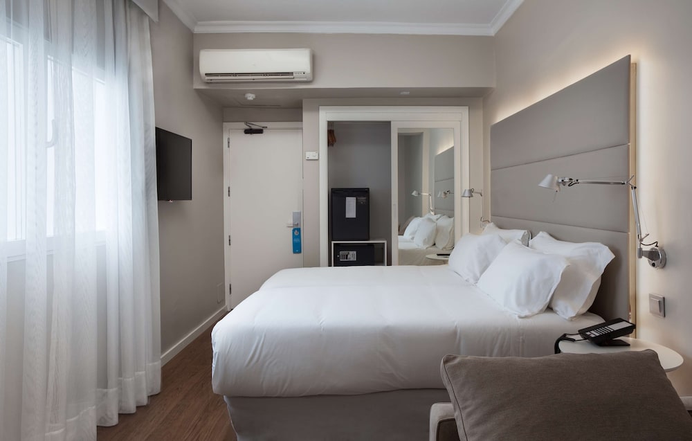 Фото Отель Nh Las Palmas Playa las Canteras