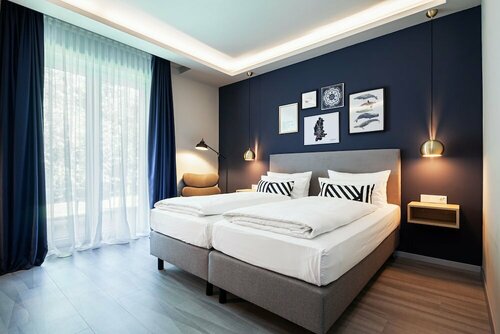 Внешний вид отеля Hotel Wittorf в Ноймюнстере, фото 1