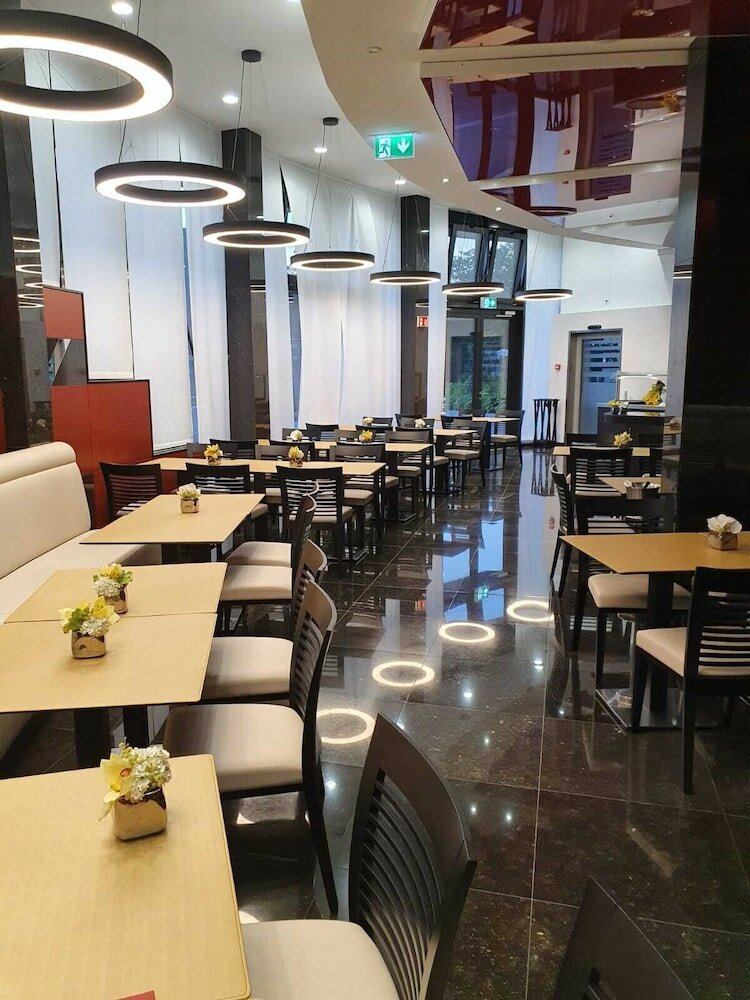 Фото Nash Suites Airport Hotel