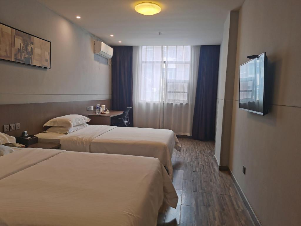 Фото Jinjiang Inn Style Xinyu Railway Station