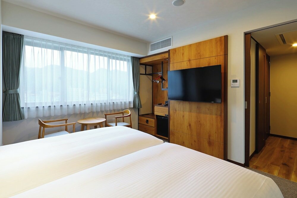 Фото Amami Sunplaza Hotel
