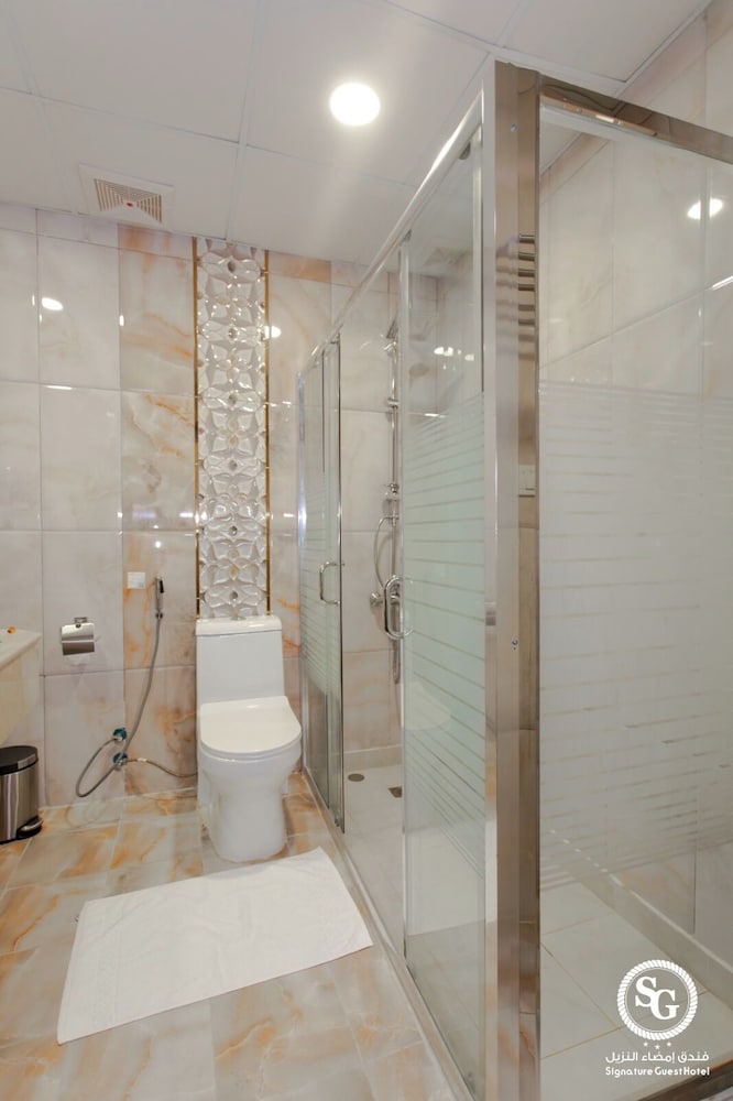 Фото Signature Guest Hotel